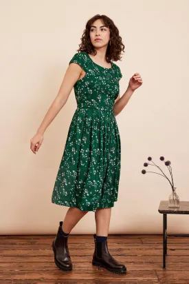 Certainly! A good optimized title for the product should include descriptive keywords and modifiers to enhance searchability and appeal. Here is an optimized version:

Claudia Womens Floral Woodland Walk Sundress - Casual Summer Midi Dress